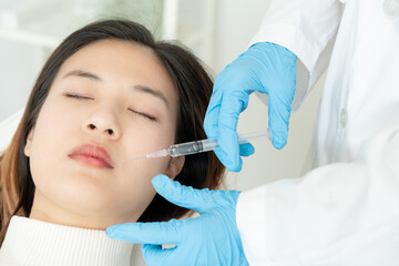 Cosmetic surgery, skin whitening injection, filler injection, Skin reface, beautiful Asian girls receive beauty treatments at beauty clinic, skincare, pore rejuvenation, wrinkle, baby face