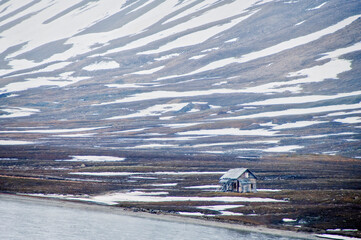 Ruins of miners hut in a wilderness area of Svalbard