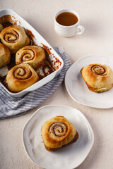 Cinnamon rolls airy breakfast with coffee and tea 