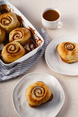 Cinnamon rolls airy breakfast with coffee and tea 