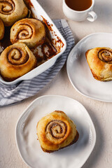 Cinnamon rolls airy breakfast with coffee and tea 