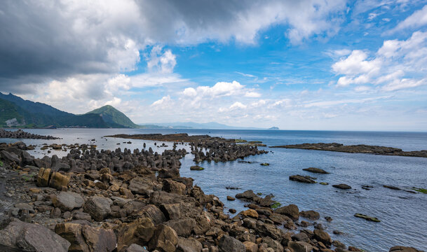 Cloudy day near the coastline, rocks are beautiful and ocean are peaceful, in Bitou Cape, New Taipei City, Taiwan.