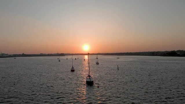 Breathtaking sunset in Clontarf Beach - Dublin - Ireland - 4K Aerial Footage