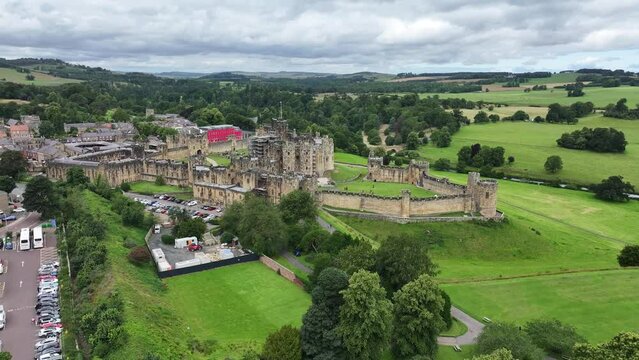 Alnwick, England UK. Aerial View of Medieval Castle, Town Buildings and Green Landscape