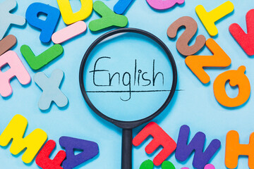 English letters scattered on blue background. Ideas for developing grammatical thinking and...