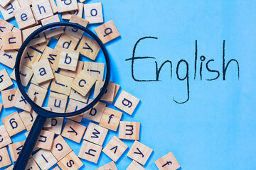English letters scattered on blue background. Ideas for developing grammatical thinking and...