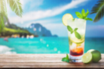 Abstract light bokeh at Summer holiday concept. Blurred image cocktail on wood with beach background. - 761140084