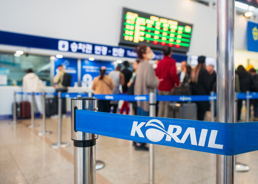 Busan, South Korea - APR 22, 2023 : Korail ticket booth at train station with People in queue 