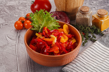 Diced raw bell red and yellow pepper