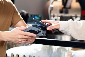 Action of paying with the telephone through a terminal in a business