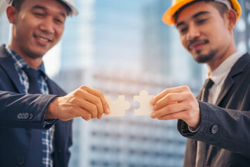  Piece of jigsaw assembly by implement multiple game puzzle. Hands of unify team connect group of business people solutions strategy