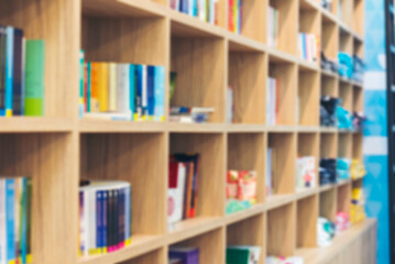 Blurry Library background off white Backdrop bright softness bookshelf with copy space. Book case Blurred background bright library silver gray lighting. defocused store light bokeh in design