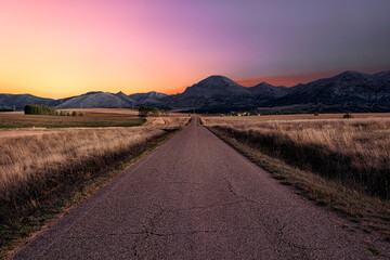 Colorful sunrise over the Palentina Mountain with the Peña Redonda as the protagonist, with a...