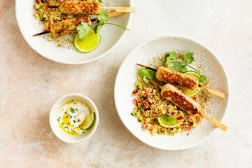 Delicious turkey kebabs with quinoa side dish and vegetables. Healthy food.