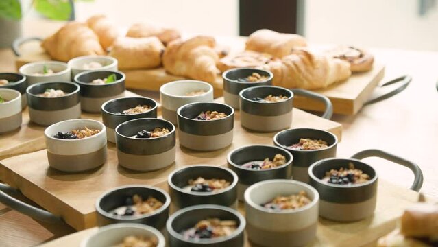 Hotel breakfast buffet spread featuring overnight oats and croissants, ideal for a nutritious morning start