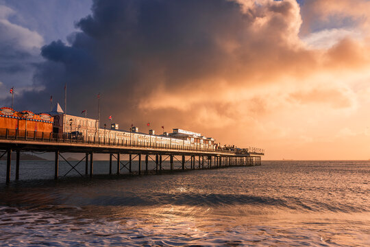 Dramatic storm clouds over Paignton Pier on the Devon coast in west England UK