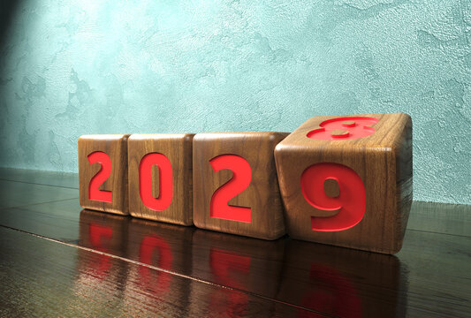 2029 four wooden box shows the year and moves from one year to another