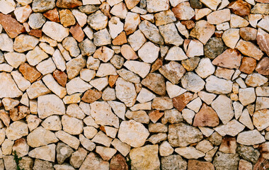 A traditional dry stone wall in Menorca, a construction technique of assembling stones of various...