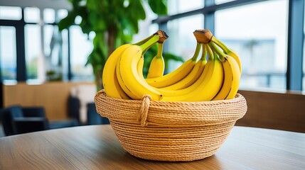 Ripe yellow bananas in a basket on a wooden background, tropical bananas,