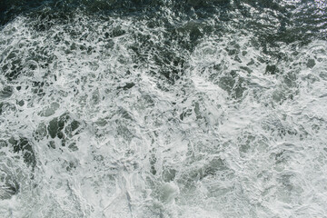 Aerial view of sea surface with waves. Summer concept. Natural background