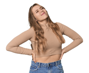 Studio portrait of a blonde Caucasian woman suffering a back pain.