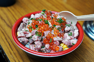 Close up Grilled Tuna and Japanese Wagyu beef on rice topped with Salmon eggs