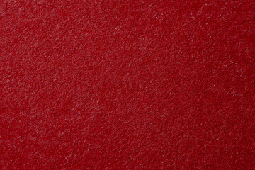 Red fluffy velvet texture background. Red velvet fabric