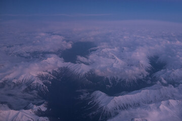 Mountains with snow from the plane