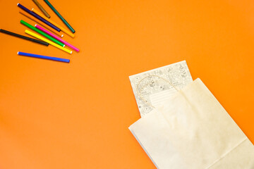 Top view brown paper shopping bag on colourful background, Mock-up of blank brown paper shopping...