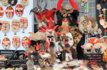 Kuker masks, magnets and dolls in souvenir shops on 