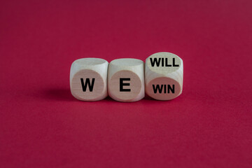 We will win symbol. Turned a cube and changes words we will to we win. Beautiful red background,...