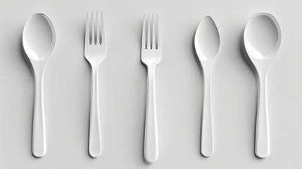 Realistic white plastic cutlery isolated on white background with disposable plastic spoon, knife, and fork icons.