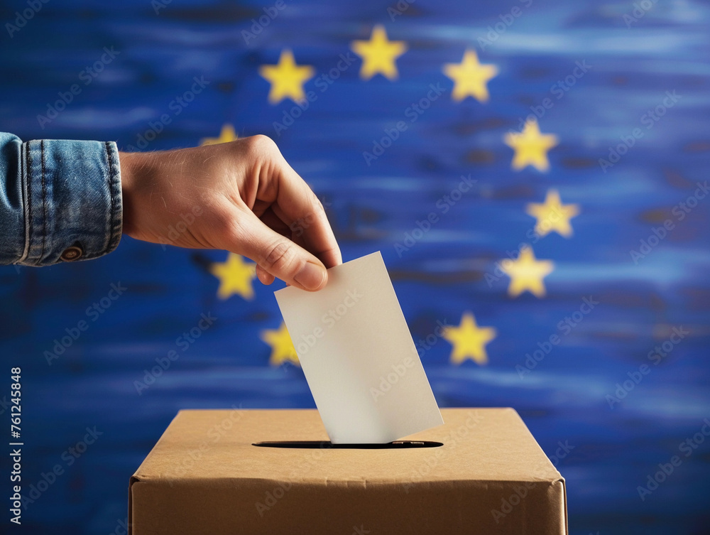 Wall mural European Union elections concept image background , ballot box with EU flag colors and stars and hand holding a ballot paper voting 