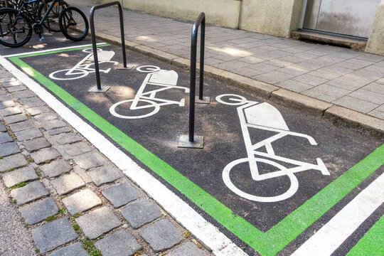 Symbols of bicycle parking on road at station
