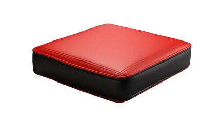 A stylish red and black ottoman contrasts against a pristine white floor