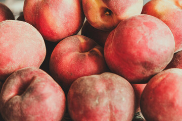 Fototapeta na wymiar Close up of a group of fresh ripe peaches, background