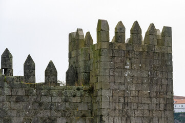 Medieval fortified wall in overcast sky, Porto, Portugal