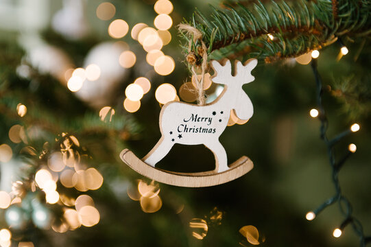 Beautiful handmade Christmas toys on the Christmas tree close-up