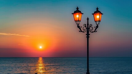 Beautiful sea sunset view with street lamps.