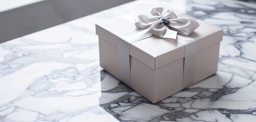 A pristine gift box sitting elegantly on a polished marble surface.