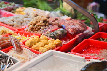 At Nanjichang Night Market, a stir-fry stall offers a variety of affordable and delicious seafood...
