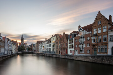 Fototapeta na wymiar The golden hour at sunrise in the historic center of Bruges, Belgium in early autumn