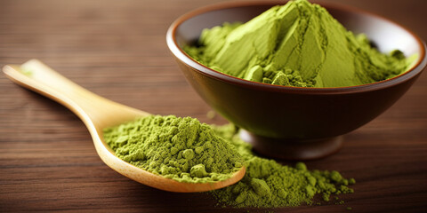 MAtcha tea powder in a wooden spoon on a table - 761310808