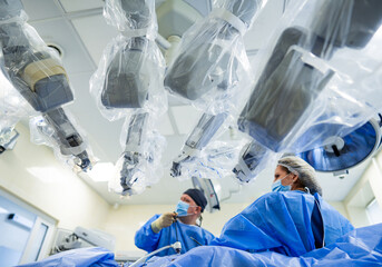 Da vinci surgery robot modern process. Futuristic operating technologies. - obrazy, fototapety, plakaty