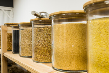 Self service bulk organic food. Eco-friendly zero waste shop. Small local business. Peeled millet, natural sesame, toasted sesame and black sesame