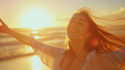  woman with long hair is smiling and dancing at the beach