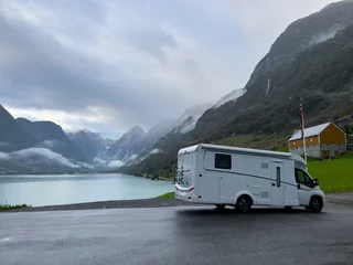 Foto auf Acrylglas Motorhome camper in Briksdal glacier valley in south Norway. Europe © Alberto Gonzalez 