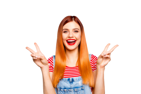 Young and pretty happy smiling woman in making v-sign with both hands isolated on bright blue background - Powered by Adobe
