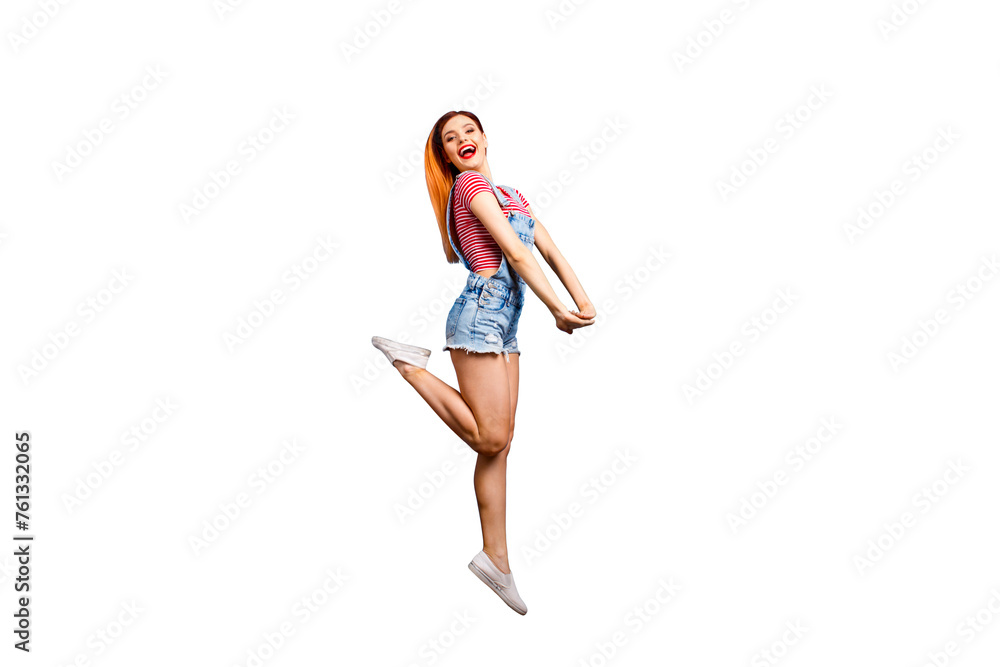 Sticker full-size portrait of jumping carefree girl who laughs happily looking straight into the camera isol