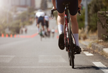 Cycling competition, cyclist athletes riding a race	